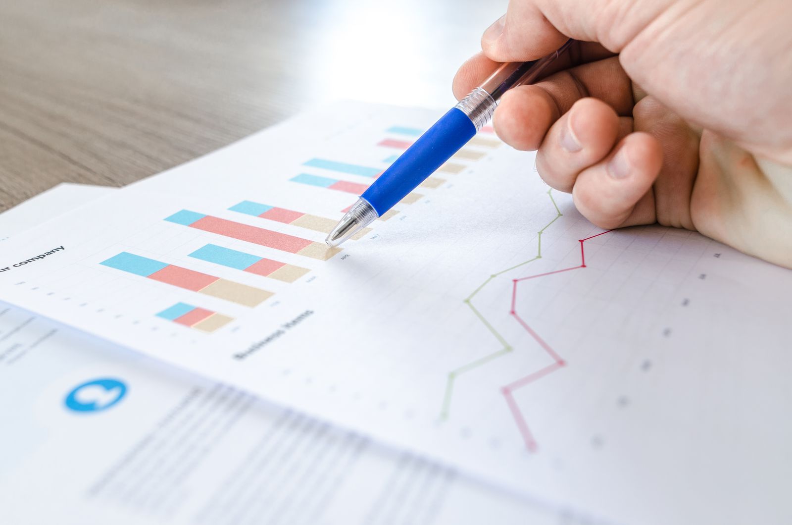 Planning notebook and budget worksheet during finance course